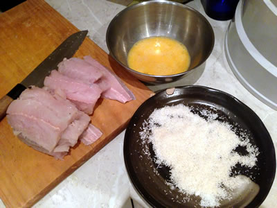 Fish with egg dipper and shredded coconut