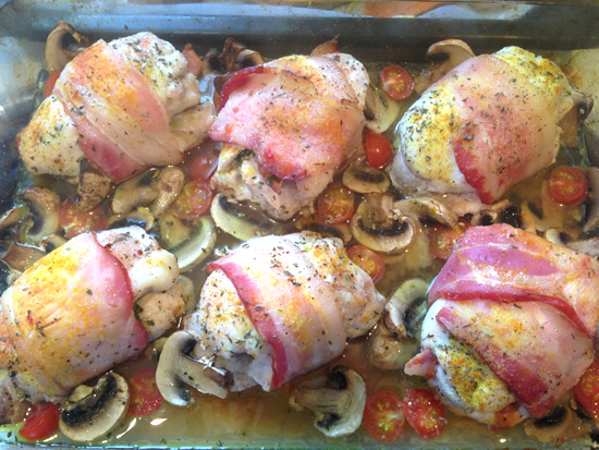 Oven-baked bacon wrapped chicken & veggies