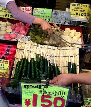 Salted cucumbers on a stick, gluten-free street treat