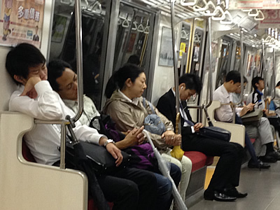 Japanese people sleep everywhere, probably due to overwork and stress.